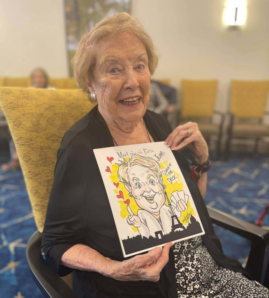 Senior resident with cartoon photo of herself
