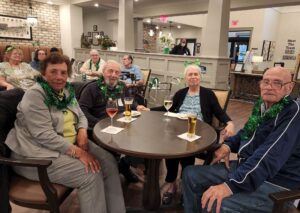 Group of seniors celebrating St. Patrick's Day