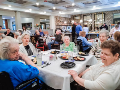 Group of seniors at dining table