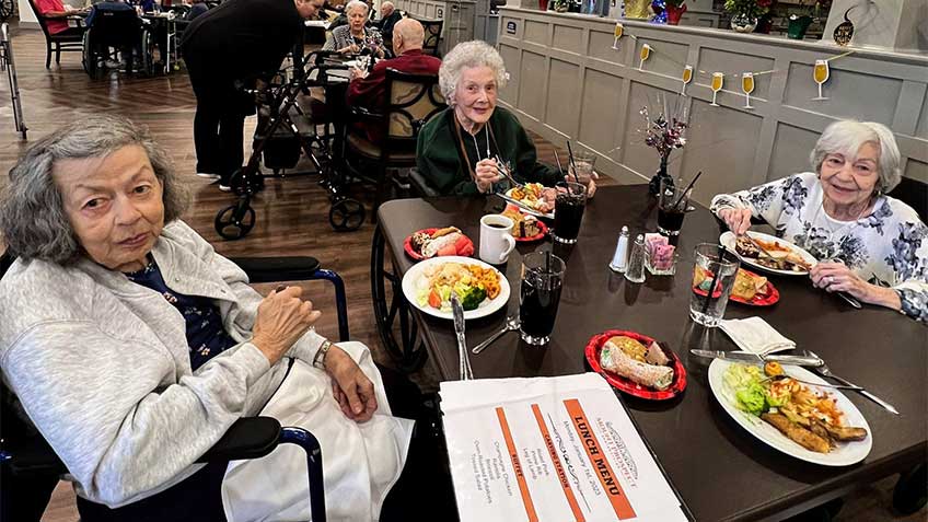 Senior women from Mount Prospect eating a meal at dining table
